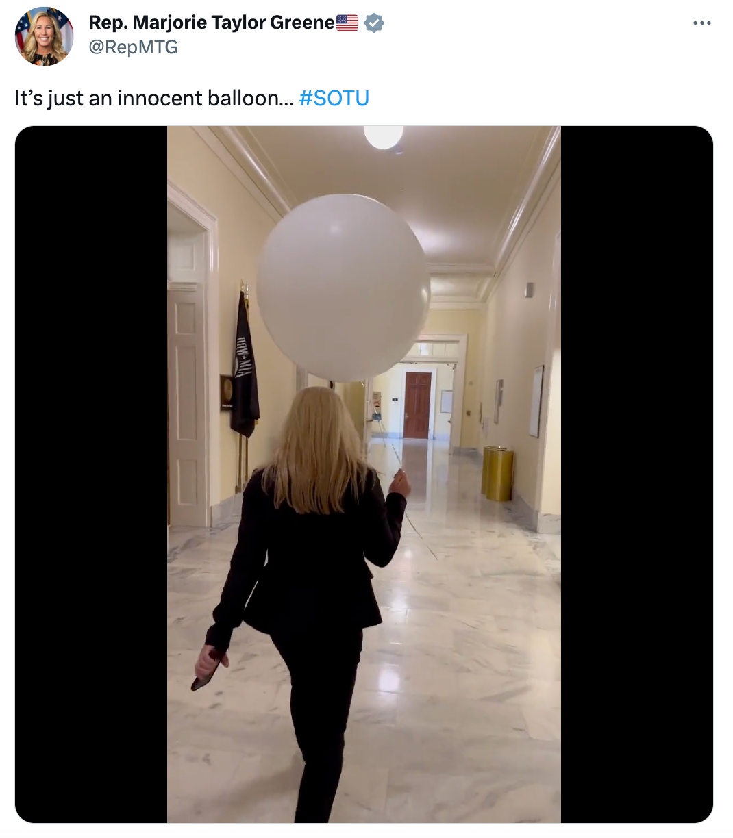 Rep. MTG walks the halls of Congress with a balloon to call out Biden's weakness