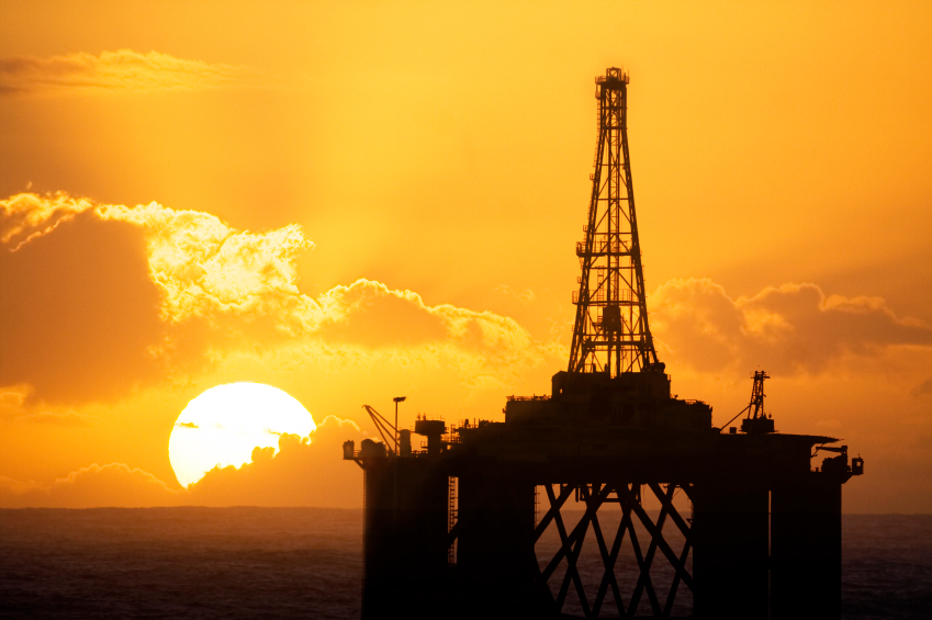 Oil rig and sunset